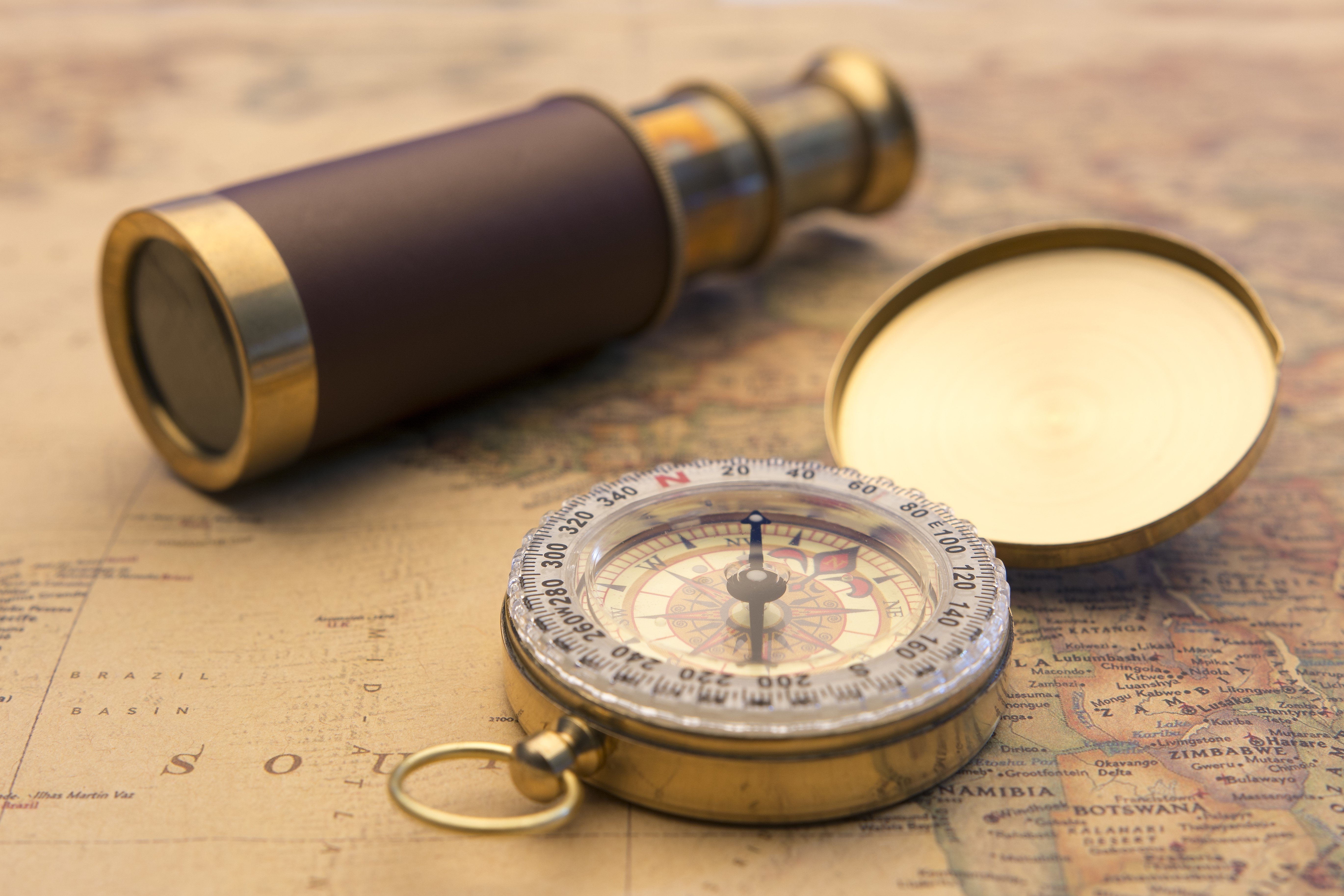 Bookkeeping Service - old compass and world map-1
