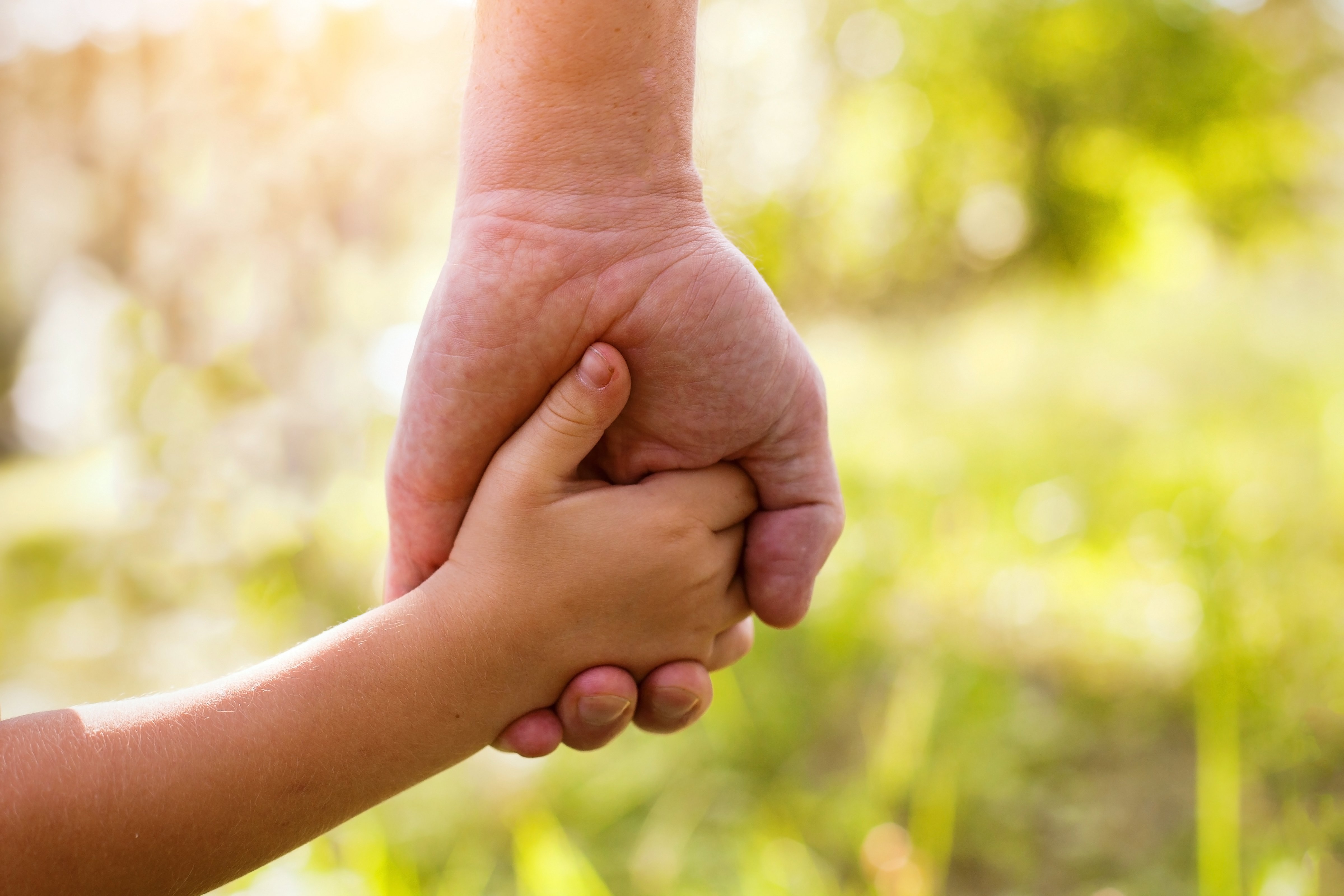 relationship - leading child by the hand - AdobeStock_74048678